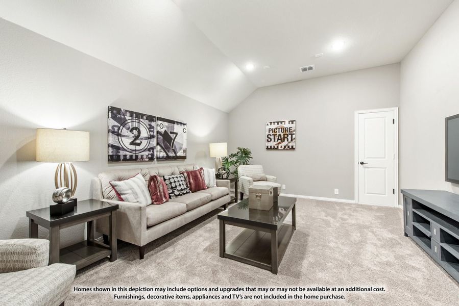 Bonus room with vaulted ceiling, carpet flooring, sofa, and wall-mounted TV