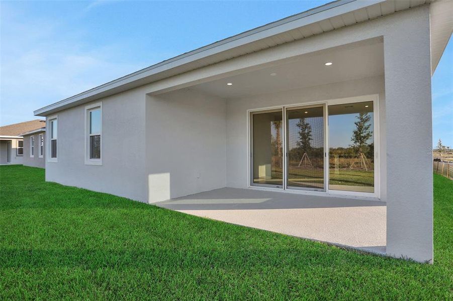 Exterior details and patio area of a home in Turnleaf, Punta Gorda (Image 25).