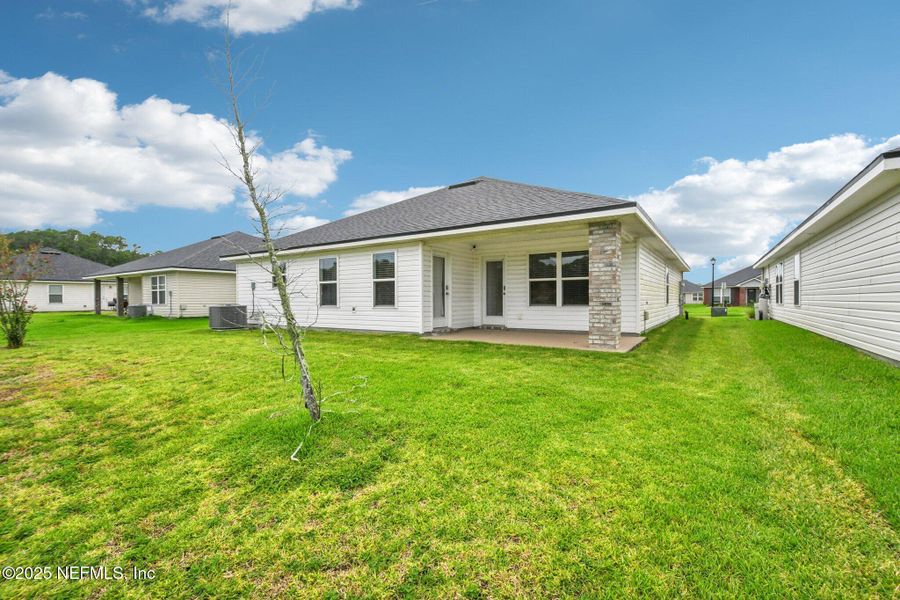 Front exterior of a new home in , Jacksonville, FL, highlighting curb appeal (Image 1). Front exterior of a new home in , Jacksonville, FL, highlighting curb appeal (Image 1).