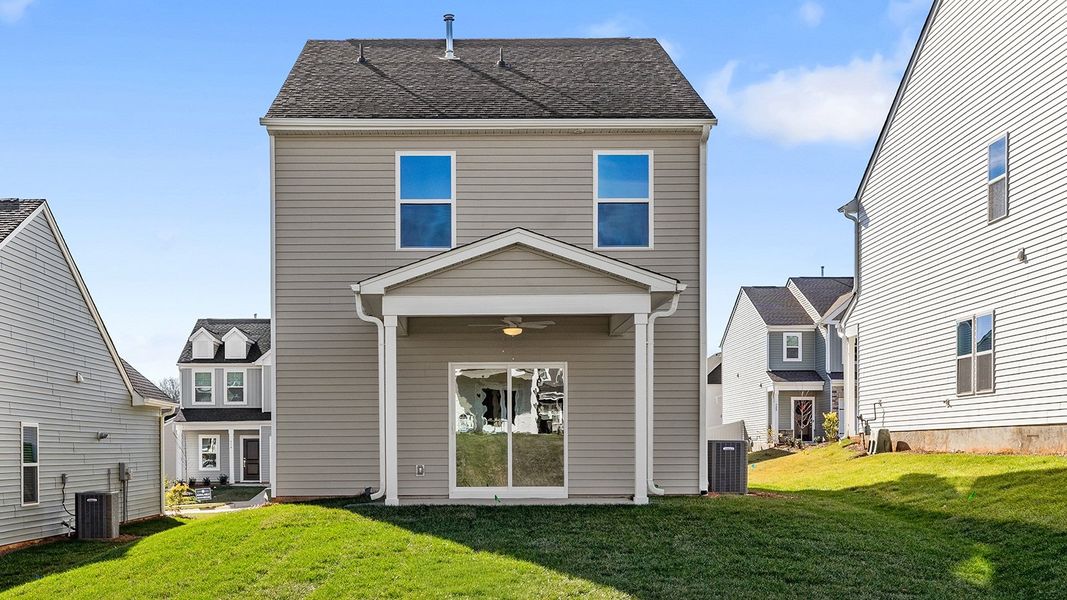 Exterior details and patio area of a home in Hanes Lake, Winston-Salem (Image 3).