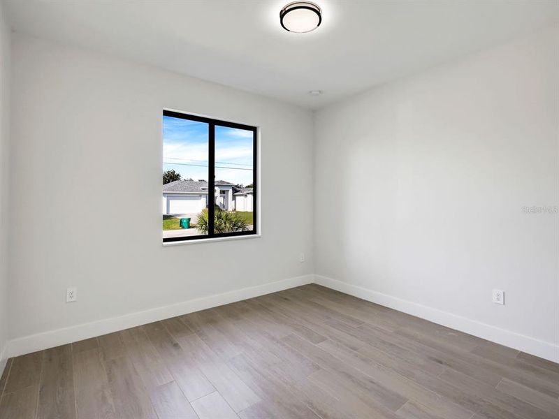 Spacious, unfurnished interior of a new home in , Port Charlotte (Image 7).
