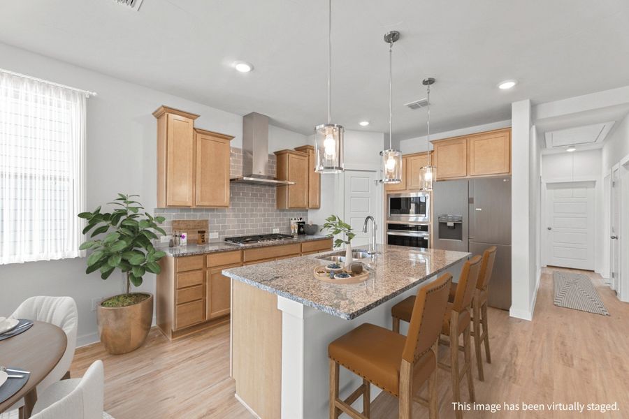 Representative furnished interior of a home built from the Sabrine by Hakes Brothers in Highland Ridge, New Braunfels (Image 7).