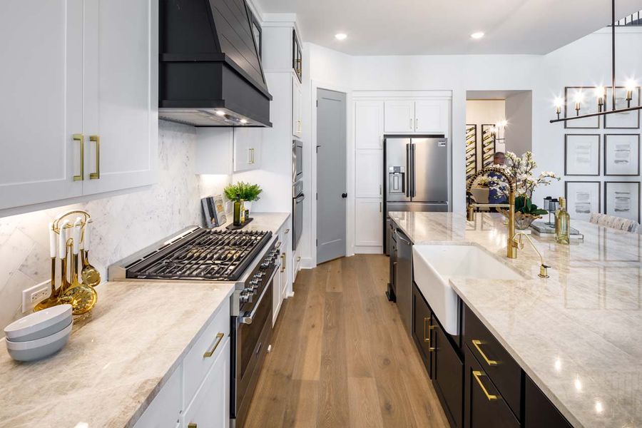 Representative furnished interior of a home built from the 222G by Highland Homes in Santa Rita Ranch, Liberty Hill (Image 12).