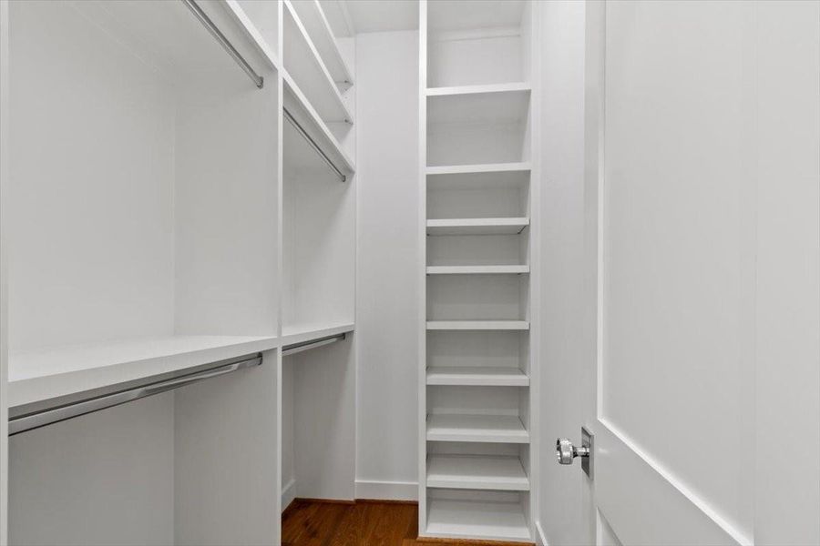 A sample view of one of the walk in closets - with built ins