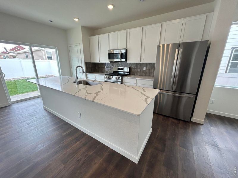 Furnished interior view inside a new home in Union Colony West, Greeley (Image 6).