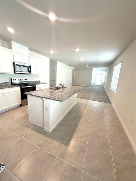 Furnished interior view inside a new home in , Kissimmee (Image 9).