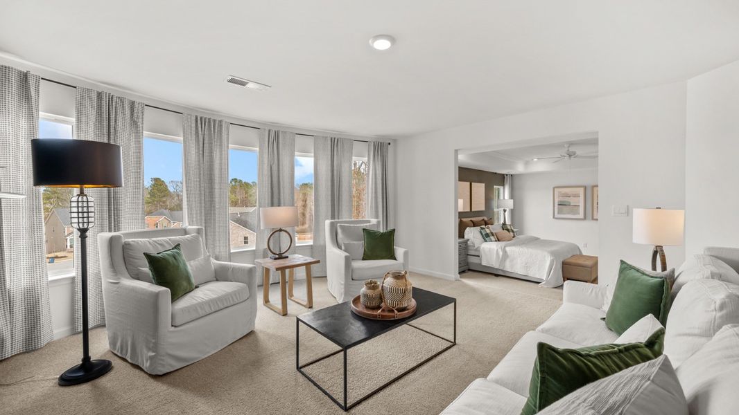 Representative furnished interior of a home built from the Savannah by D.R. Horton in Water Oak Estates, Lawrenceville (Image 23).