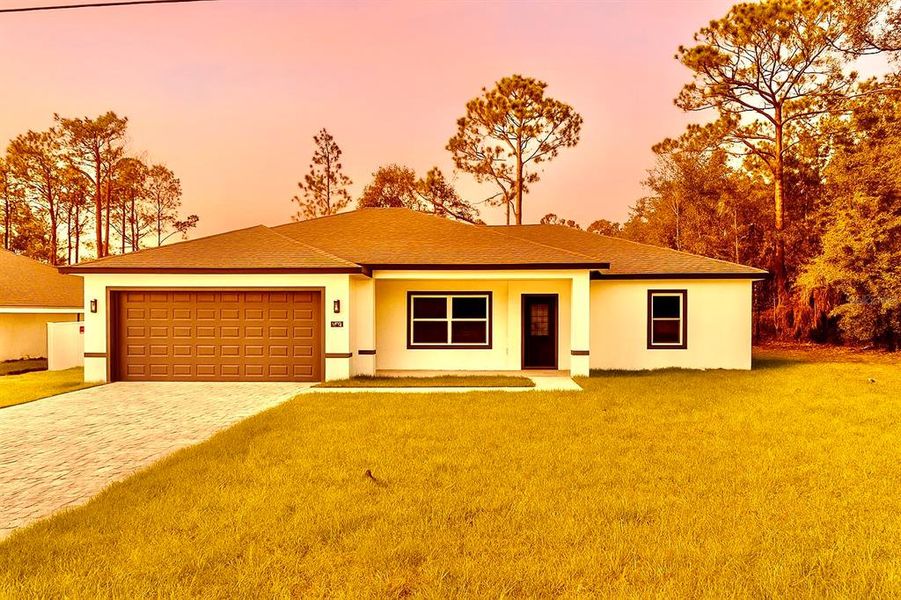 Front exterior of a new home in , Citrus Springs, FL, highlighting curb appeal (Image 2). Front exterior of a new home in , Citrus Springs, FL, highlighting curb appeal (Image 2).