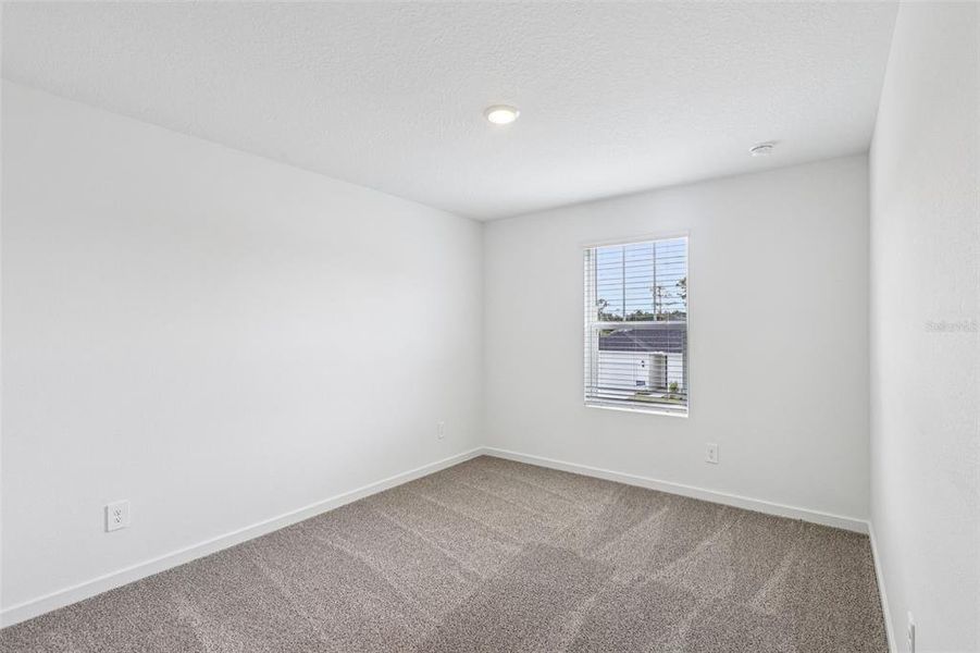Spacious, unfurnished interior of a new home in Flagler Village - Signature Series, Palm Coast (Image 28). Spacious, unfurnished interior of a new home in Flagler Village - Signature Series, Palm Coast (Image 28).