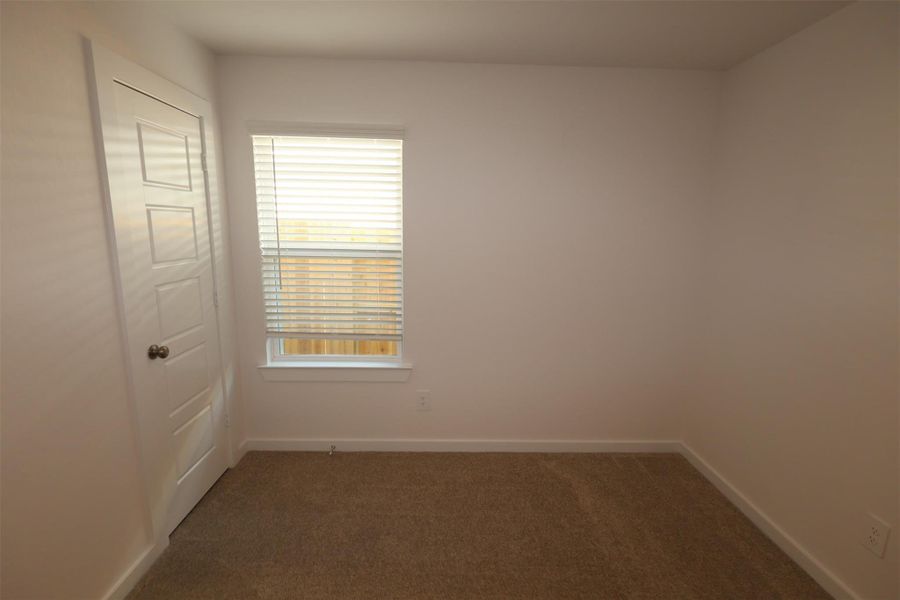 Spacious, unfurnished interior of a new home in Pinewood at Grand Texas, New Caney (Image 16).