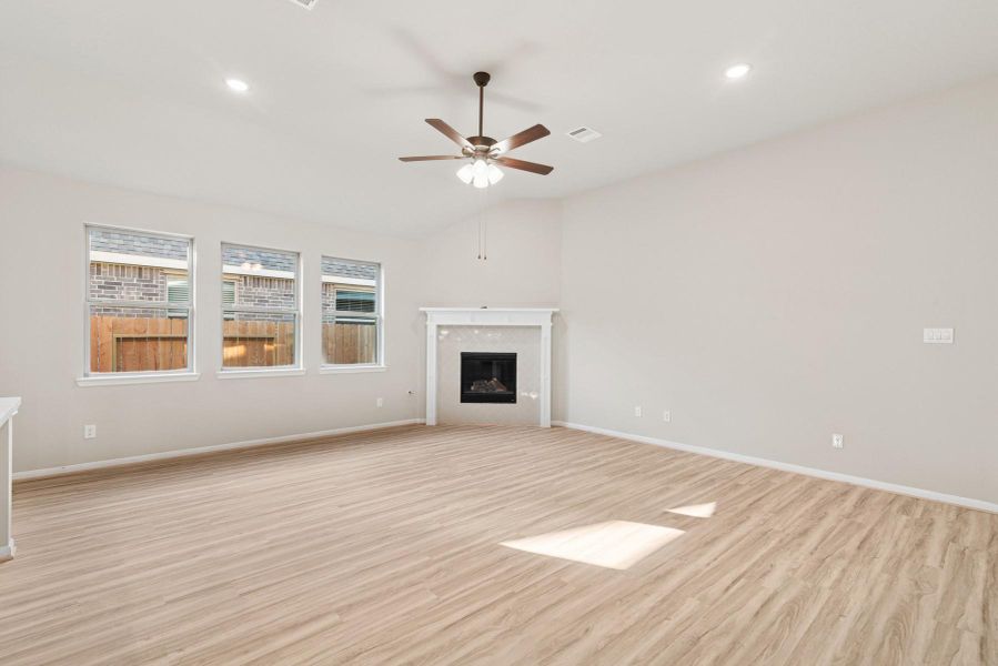 Open great room with cozy fireplace (*Photo not of actual home and used for illustration purposes only.) Open great room with cozy fireplace (*Photo not of actual home and used for illustration purposes only.)