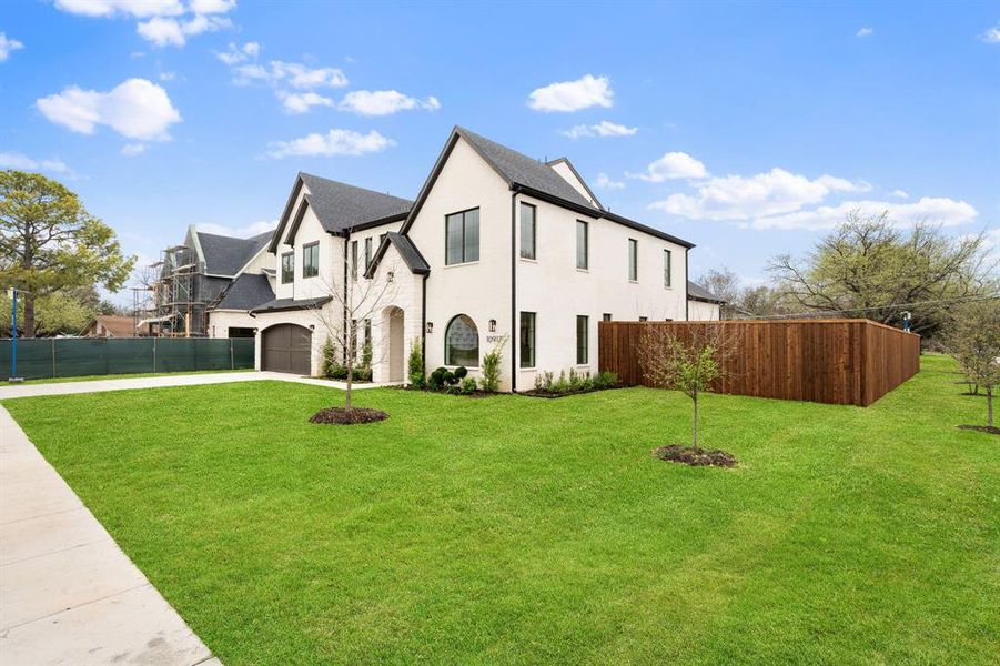 Front exterior of a new home in , Dallas, TX, highlighting curb appeal (Image 25). Front exterior of a new home in , Dallas, TX, highlighting curb appeal (Image 25).