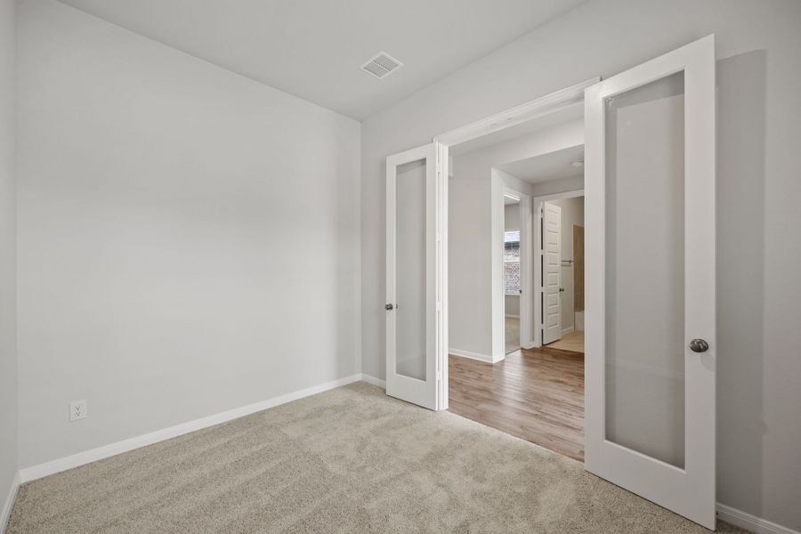 Representative unfurnished interior of a home built from the Baker by Cambridge Homes in Tinsley Meadows, Van Alstyne (Image 10).