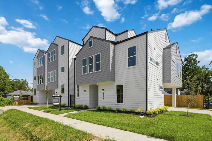 Front exterior of a new home in , Houston, TX, highlighting curb appeal (Image 20).