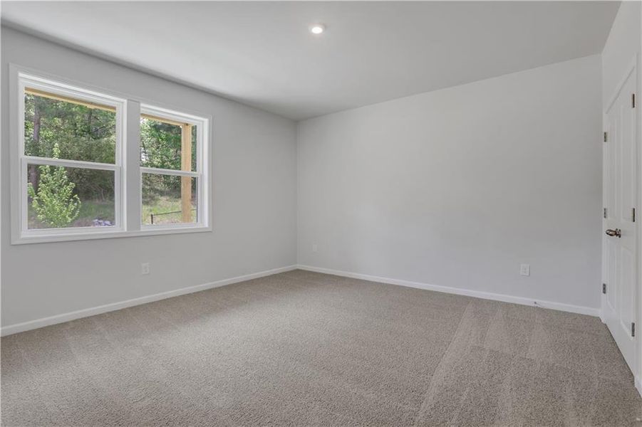 Spacious, unfurnished interior of a new home in Towne Village at Suwanee Dam, Sugar Hill (Image 12).