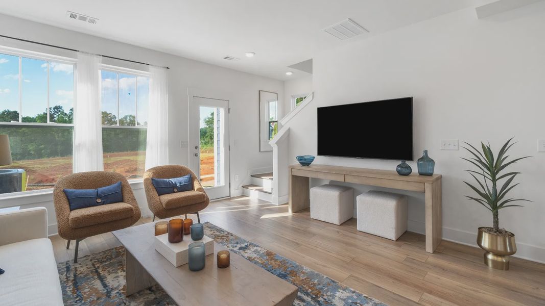 Exclusive living space with tasteful touches, natural light, and a vibrant open-concept feel of The Churchill Design