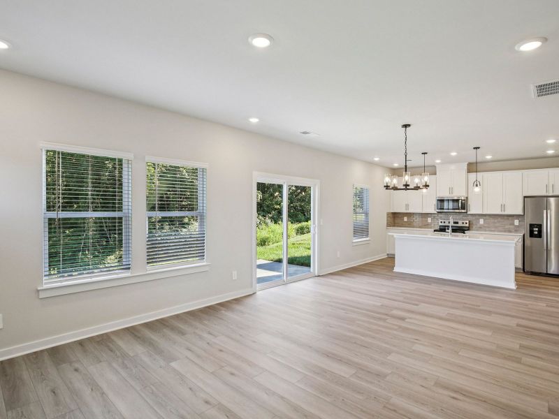 The open-concept floorplan allows for an easy flow between the kitchen and dining areas.