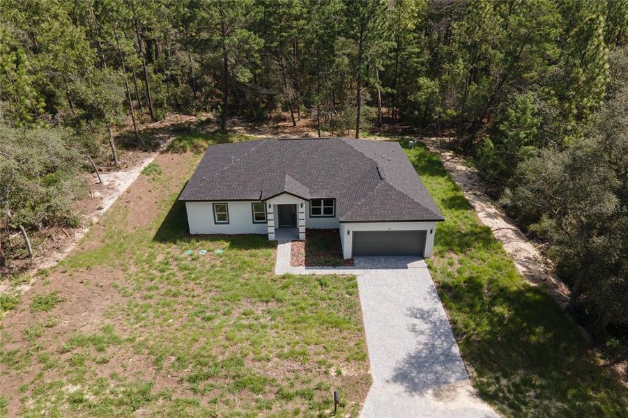 Front exterior of a new home in , Dunnellon, FL, highlighting curb appeal (Image 2). Front exterior of a new home in , Dunnellon, FL, highlighting curb appeal (Image 2).
