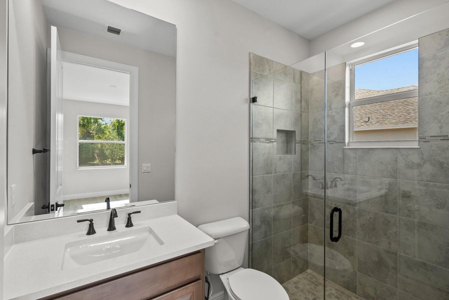 Representative furnished interior of a home built from the Weston Signature by GHO Homes in High Pointe, Vero Beach (Image 37).