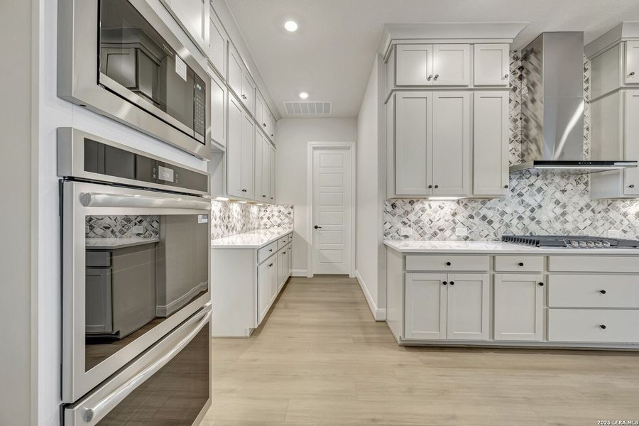 Furnished interior view inside a new home in Megans Landing – Half-Acre Homesites, Castroville (Image 5).