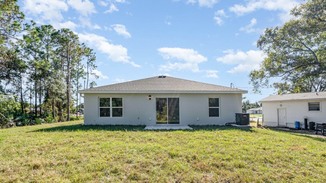 Exterior details and patio area of a home in Palm Bay, Palm Bay (Image 2). Exterior details and patio area of a home in Palm Bay, Palm Bay (Image 2).
