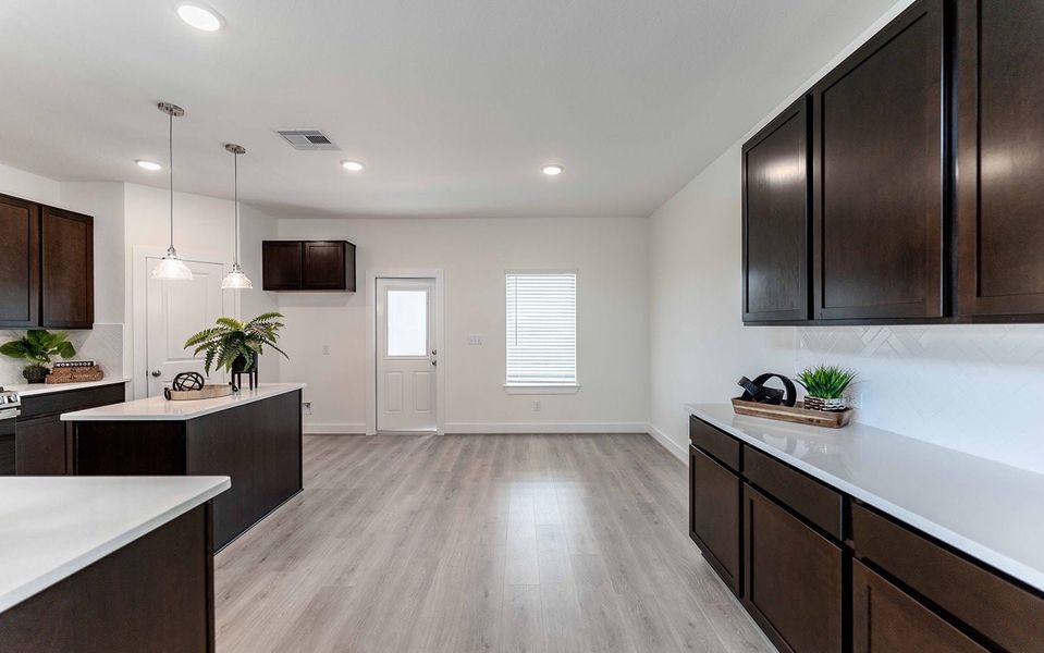 Furnished interior view inside a new home in Massey Oaks, Pearland (Image 5).