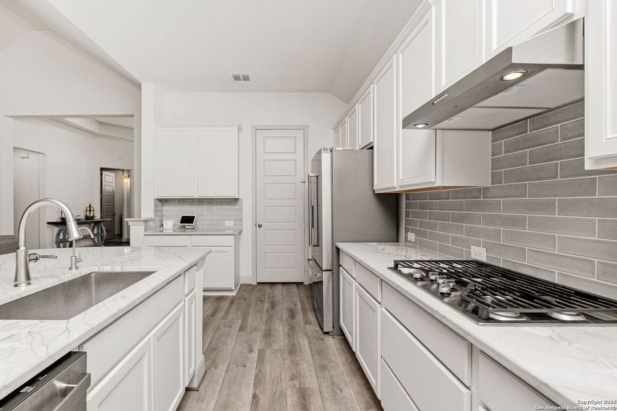 Furnished interior view inside a new home in Esperanza – New Phase Now Selling, Boerne (Image 6). Furnished interior view inside a new home in Esperanza – New Phase Now Selling, Boerne (Image 6).