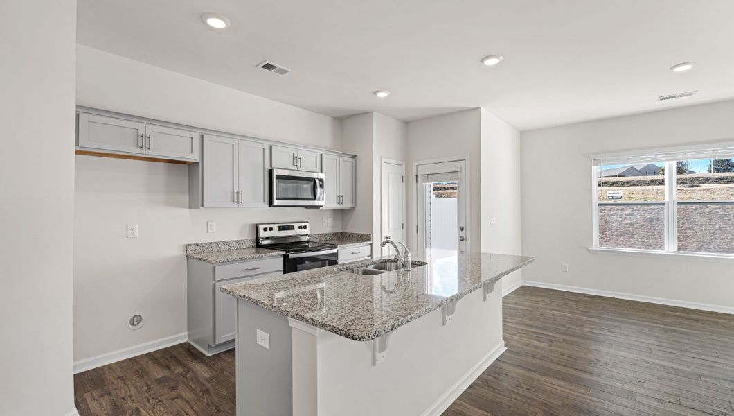 Furnished interior view inside a new home in Tanglewood Townes, Greenville (Image 6).