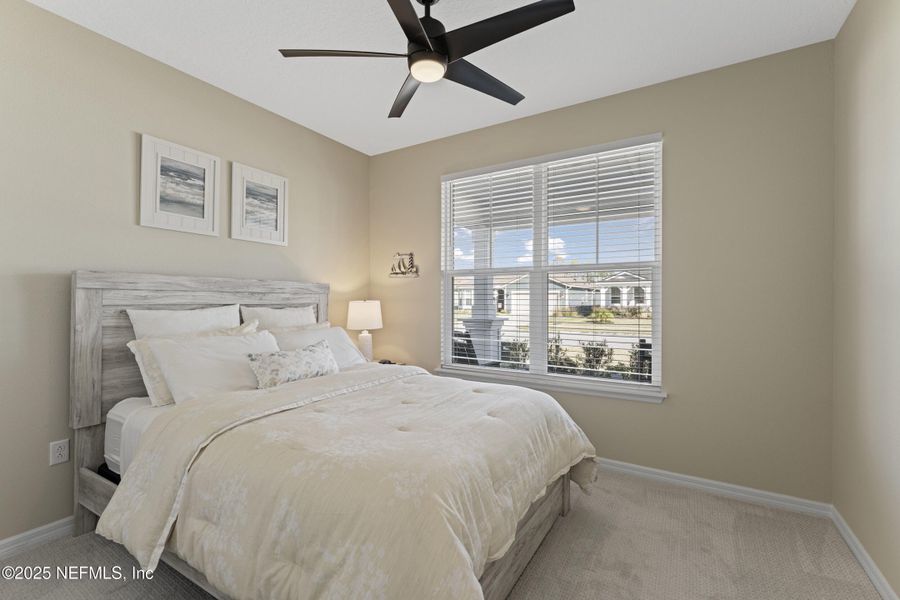 Furnished interior view inside a new home in Summer Bay at Grand Oaks, St. Augustine (Image 32).