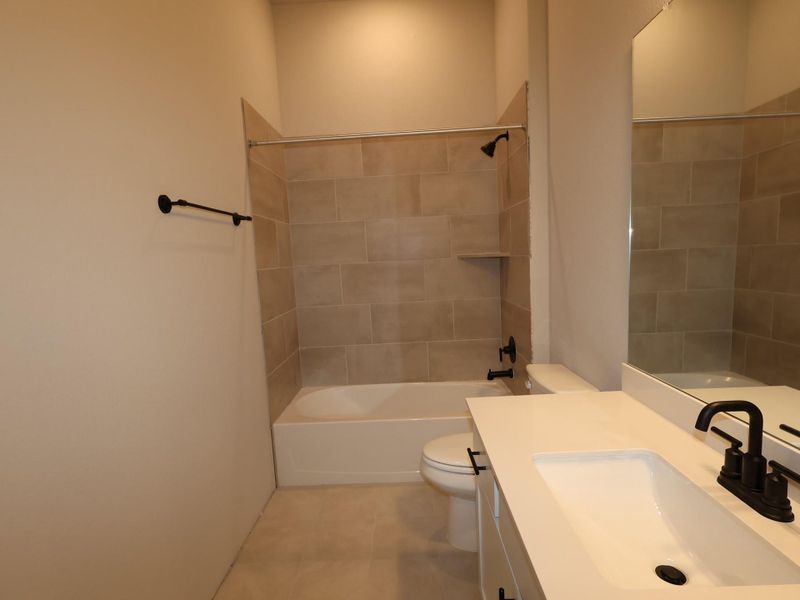 Furnished interior view inside a new home in Heritage, Dripping Springs (Image 7).