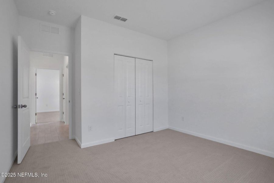 Spacious, unfurnished interior of a new home in Cordova Palms, St. Augustine (Image 14).