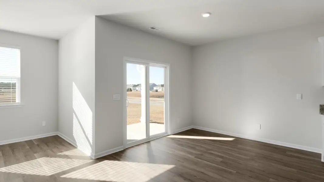 Spacious, unfurnished interior of a new home in The Grove at Blake Farm, Wilmington (Image 11).