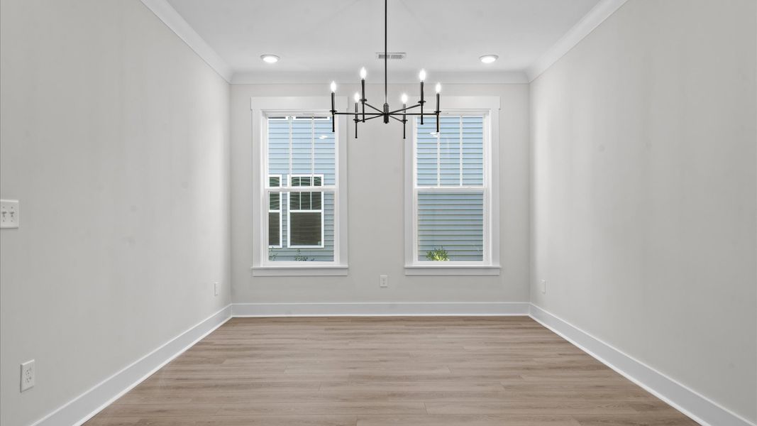 Desirable formal dining room with accomplished details in a reputable DRB Homes community Desirable formal dining room with accomplished details in a reputable DRB Homes community