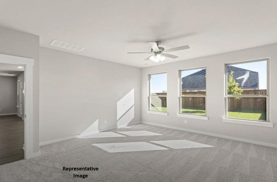 Natural sunshine spills through the windows of this generously-sized main bedroom! Natural sunshine spills through the windows of this generously-sized main bedroom!