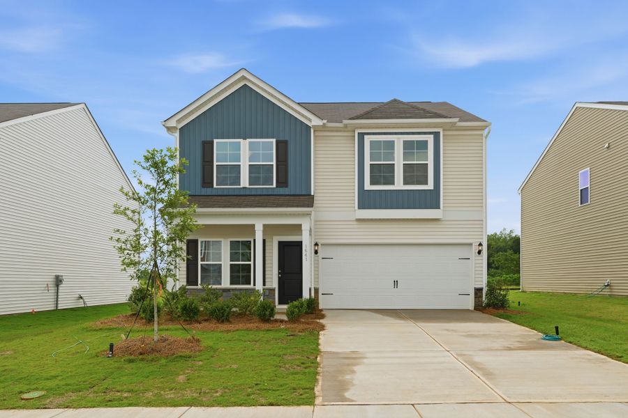 Front exterior of a new home in Piper Creek, Newton, NC, highlighting curb appeal (Image 1). Front exterior of a new home in Piper Creek, Newton, NC, highlighting curb appeal (Image 1).