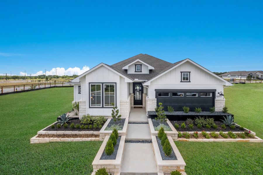 Representative exterior photo of a completed home built from the Elgin by Scott Felder Homes in Prominence, San Antonio, TX (Image 25). Representative exterior photo of a completed home built from the Elgin by Scott Felder Homes in Prominence, San Antonio, TX (Image 25).