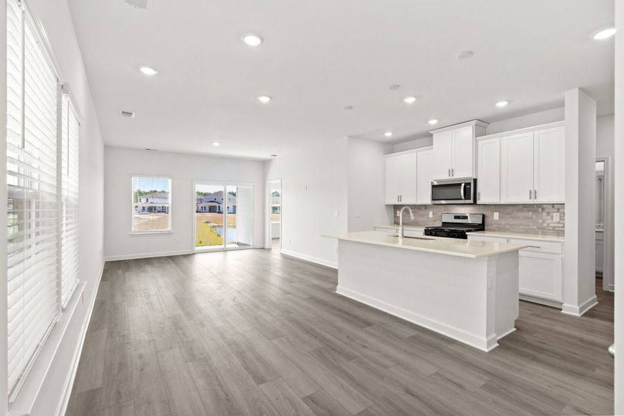 Furnished interior view inside a new home in Waterside - Boardwalk Series, Longs (Image 7).