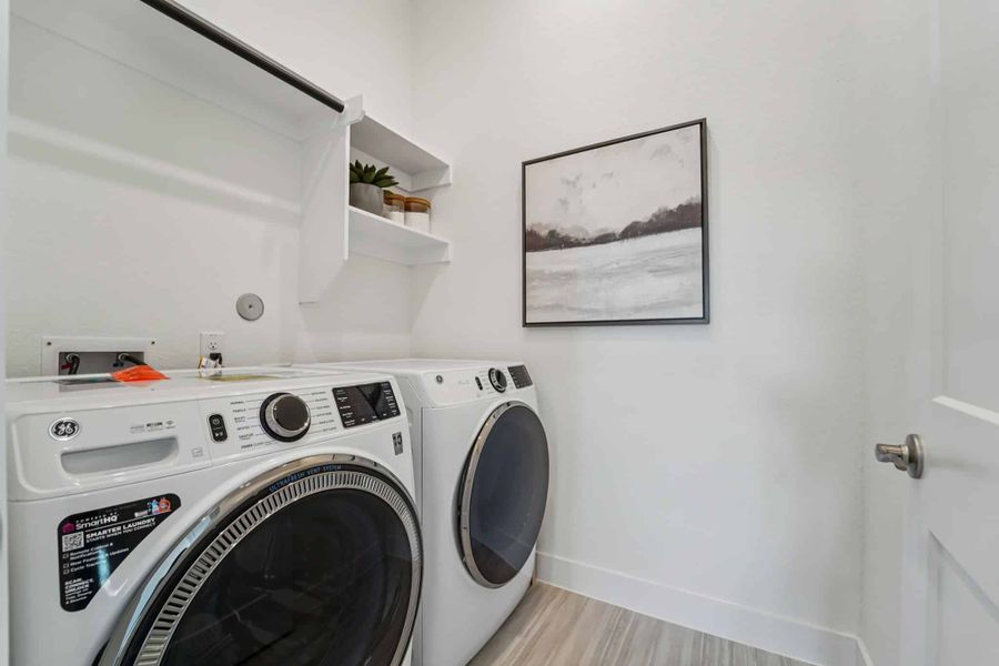 Furnished interior view inside a new home in Bridgeland, Cypress (Image 16).
