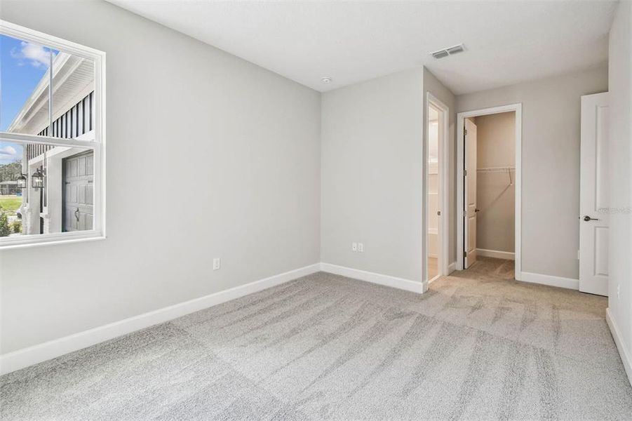 Spacious, unfurnished interior of a new home in Solace at Corner Lake, Orlando (Image 52).