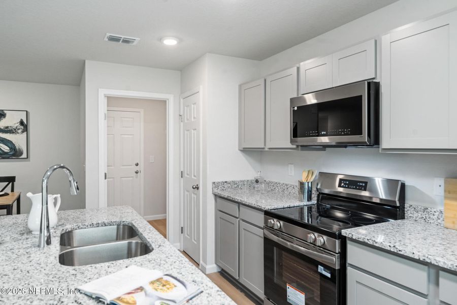 Furnished interior view inside a new home in , Jacksonville (Image 13).