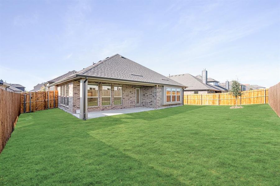Exterior details and patio area of a home in West Crossing, Anna (Image 22). Exterior details and patio area of a home in West Crossing, Anna (Image 22).