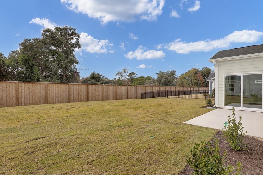 Exterior details and patio area of a home in East Wynd, Hampstead (Image 4).