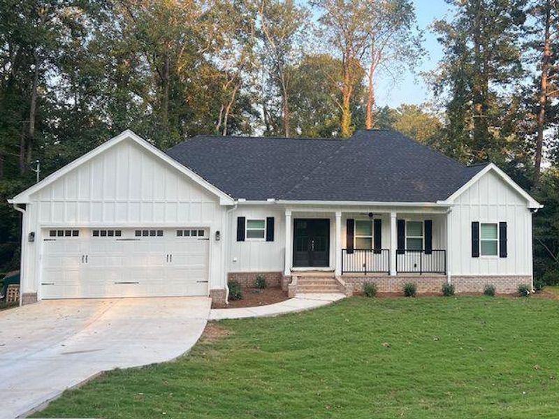 Front exterior of a new home in , Griffin, GA, highlighting curb appeal (Image 2).