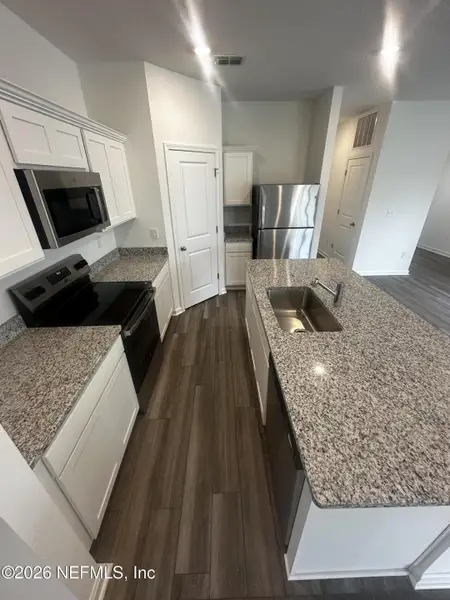 Furnished interior view inside a new home in , Palm Coast (Image 5).