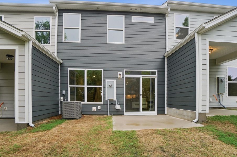 Exterior details and patio area of a home in Harrisburg Village Townhomes, Harrisburg (Image 3). Exterior details and patio area of a home in Harrisburg Village Townhomes, Harrisburg (Image 3).