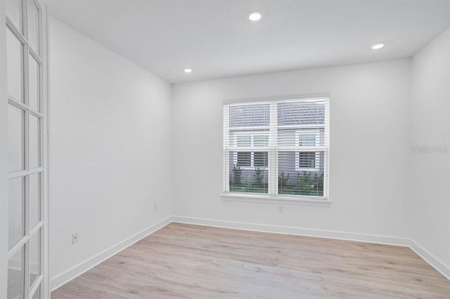 Spacious, unfurnished interior of a new home in Esplanade at Center Lake Ranch, St. Cloud (Image 21).