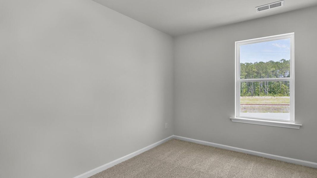 Spacious, unfurnished interior of a new home in Townes at Seabrooke, Leland (Image 25).