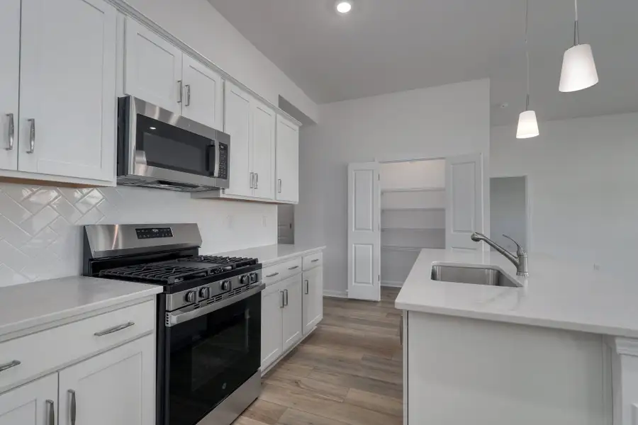 Furnished interior view inside a new home in Garden Grove, Conway (Image 9).