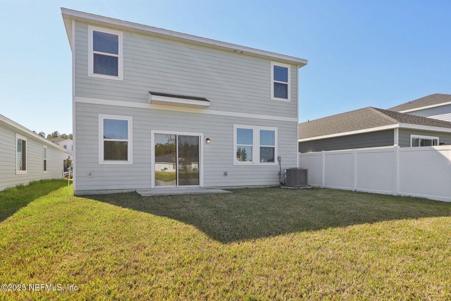 Exterior details and patio area of a home in Kings Preserve, Jacksonville (Image 22).
