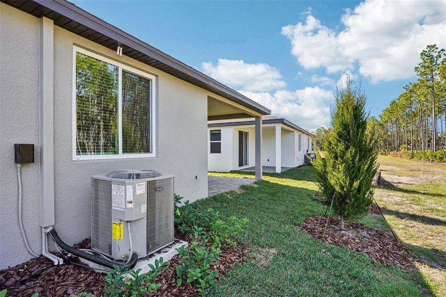 Exterior details and patio area of a home in Ridgehaven - Villas, Ormond Beach (Image 25).